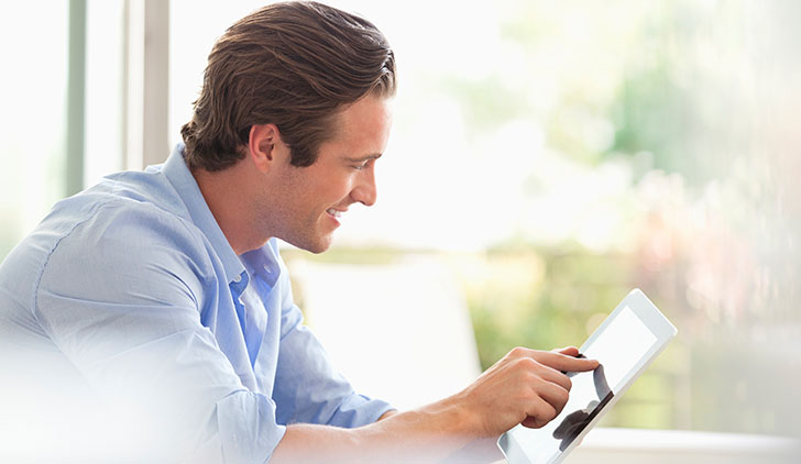 Man holding a tablet