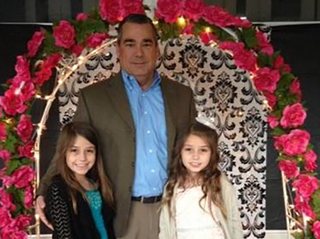 Publix associate Bob Lawrence and daughters